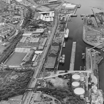 Greenock, James Watt Dock, oblique aerial view, taken from the ESE. Cappielow is visible in the left centre of the photograph.