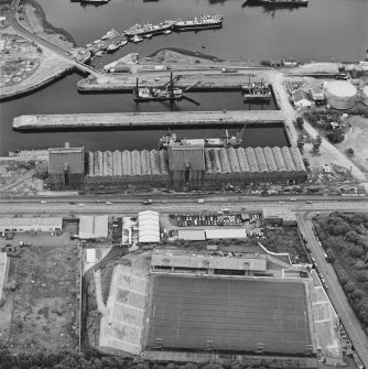Greenock, James Watt Dock, oblique aerial view, taken from the SSW. Cappielow is visible in the bottom half of the photograph.
