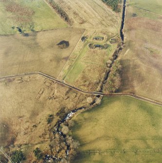 Oblique aerial centred on the remains of the anti-aircraft battery, taken from the ESE.