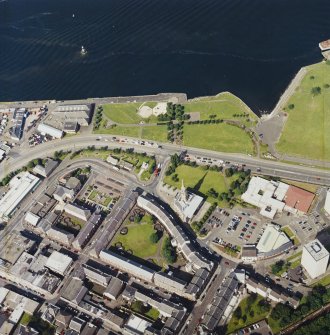 Oblique aerial view centred on the tolbooth and the quay, taken from the SW.