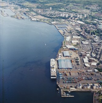 General oblique aerial view looking across the pier towards Greenock, taken from the NW.