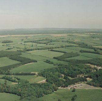 General aerial view of Loudoun Castle, estate policies, gardens and fairground, taken from the SW.