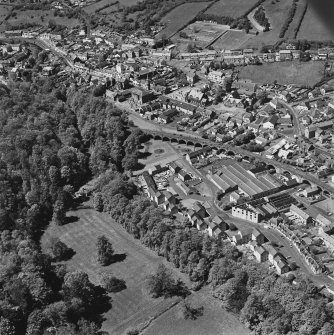 Aerial view of Newmilns railway viaduct and factories, centred on Greenhead Mills, taken from the ESE.