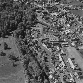 Aerial view of Newmilns railway viaduct and factories, centred on Greenhead Mills, taken from the E.