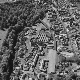 Aerial view of Newmilns railway viaduct and factories, centred on Greenhead Mills, taken from the E.