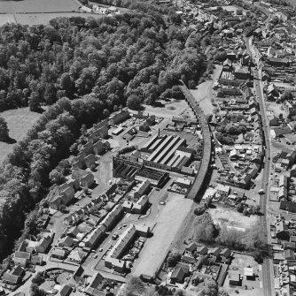 Aerial view of Newmilns railway viaduct and factories, centred on Greenhead Mills, taken from the ENE.