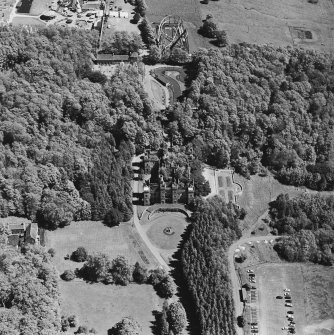 Aerial view of Loudoun Castle, gardens, estate policies and fairground, taken from the W.