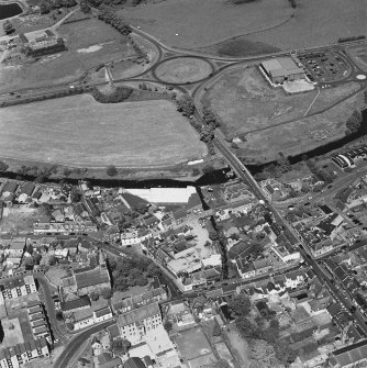 Aerial view of Galston road bridge and Church Lane Lace Mill, taken from SSW.