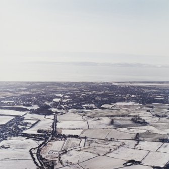 General oblique aerial view of the island of Arran looking across the town of Kilmarnock, taken from the E.