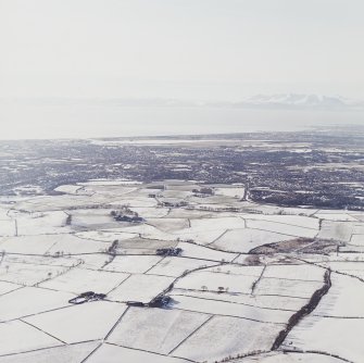 General oblique aerial view of the island of Arran looking across the town of Kilmarnock, taken from the E.