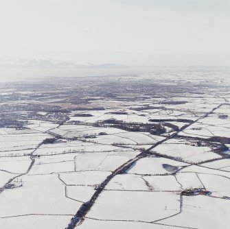 General oblique aerial view of the island of Arran looking across the town of Kilmarnock, taken from the E.