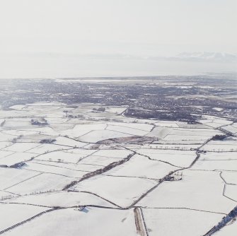 General oblique aerial view of the island of Arran looking across the town of Kilmarnock, taken from the E.