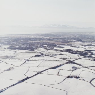 General oblique aerial view of the island of Arran looking across the town of Kilmarnock, taken from the E.