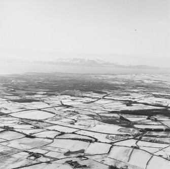 General oblique aerial view of the island of Arran looking across the town of Kilmarnock, taken from the E.