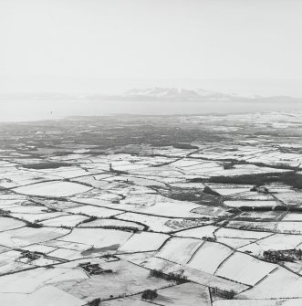 General oblique aerial view of the island of Arran looking across the town of Kilmarnock, taken from the E.