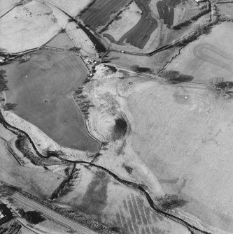 Oblique aerial view centred on the remains of the railway viaduct, taken from the SE.