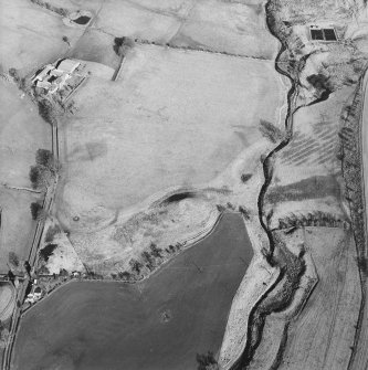 Oblique aerial view centred on the remains of the railway viaduct, taken from the WSW.