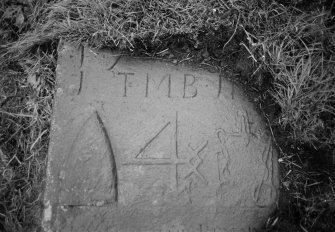 Detail of grave slab for Peter Graham dated 1735, in the churchyard of Kilmadock Old Parish Church.