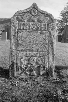 View of gravestone for John Murray's children, 'IM, SH' dated 1777, in the churchyard of Glenshee Church..