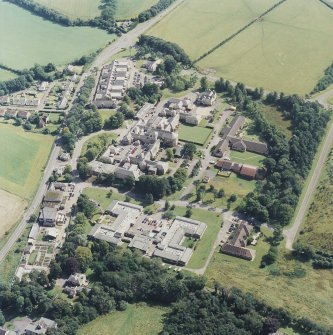 Oblique aerial view centred on the hospital, taken from the WNW.
