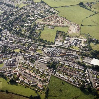 Oblique aerial view centred on the engineering works, taken from the SE.