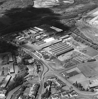 Oblique aerial view of Craigneuk St, Motherwell, centred on the Anderson Boyes Works, taken from the SE.