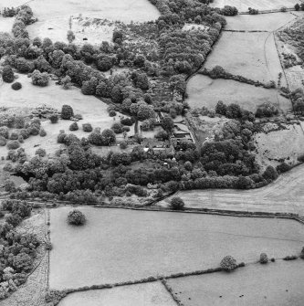 Formakin, oblique aerial view, taken from the WSW, centred on Formakin Mill and out-buildings of Formakin House.