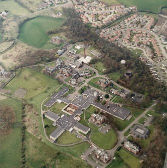 Oblique aerial view centred on the hospital, taken from the SSE.