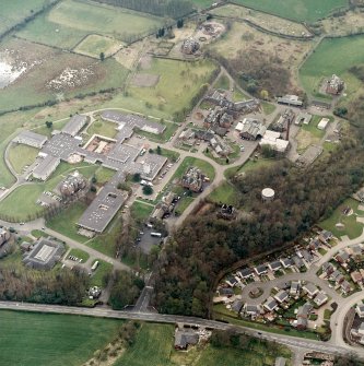 Oblique aerial view centred on the hospital, taken from the E.