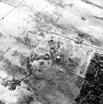Oblique aerial view centred on the remains of the anti-aircraft battery with traces of the camp adjacent, taken from the N.