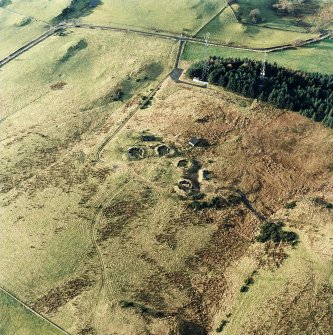 Oblique aerial view centred on the remains of the anti-aircraft battery with traces of the camp adjacent, taken from the E.