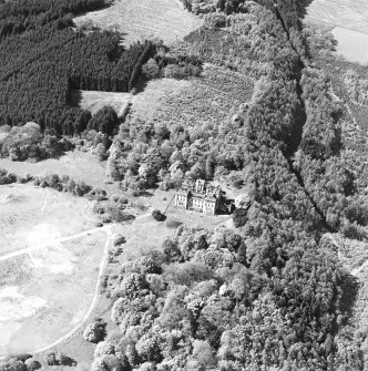 Oblique aerial view centred on the site of the hospital after the demolition of most buildings, taken from the NE.