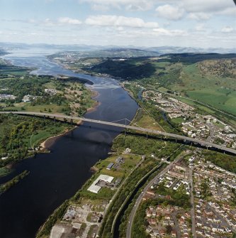 General oblique aerial view looking across the bridge and canal, Clydebank and Old Kilpatrick, along the River Clyde towards Dumbarton, Greenock and the Firth of Clyde, taken from the SE.