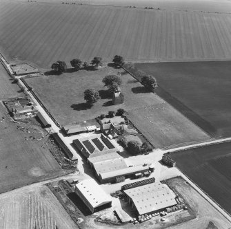 Oblique aerial photograph from SW with farm buildings.