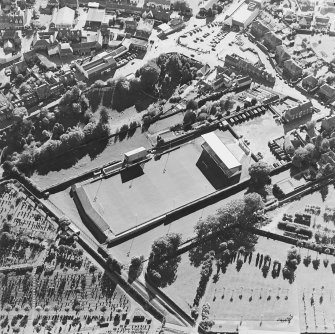 Oblique aerial view centred on the football ground, taken from the ENE.