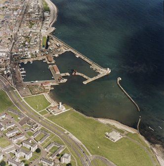 Oblique aerial view centred on the harbour and signal station, taken from the WSW.