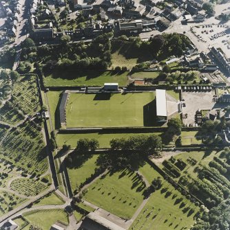 Oblique aerial view centred on the football ground, taken from the NE.