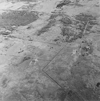 Oblique aerial view of the grenade range and adjacent rifle range, with the disused moving target range in the background, taken from the SW.