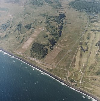 Oblique aerial view centred on the eastern rifle ranges, taken from the ENE.