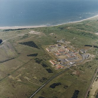 Oblique aerial view of Buddon Camp, taken from the NE.