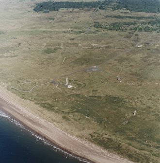 Oblique aerial view, centred on the lighthouses with rifle ranges in the background, taken from the SSE.