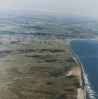 Oblique aerial view of the eastern ranges with the golf course in the background, taken from the SSW.