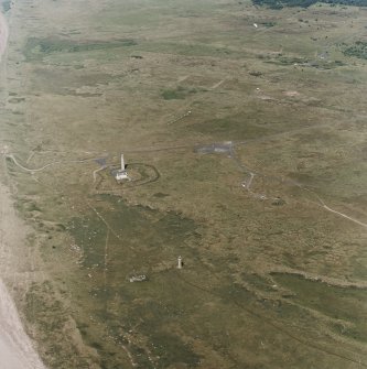 Oblique aerial view, centred on the lighthouses with rifle ranges in the background, taken from the ESE.