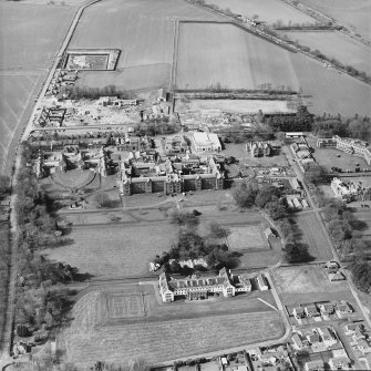 Oblique aerial view of the hospitals, taken from the SE.