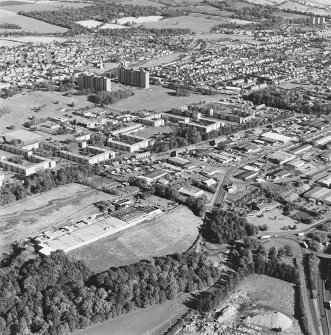 General oblique aerial view of the factory with the industrial estate adjacent, taken from the SW.