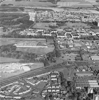 General oblique aerial view of the factory and the area of Ardler, taken from the SSW.
