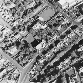 Oblique aerial view centred on the church, taken from the SW.