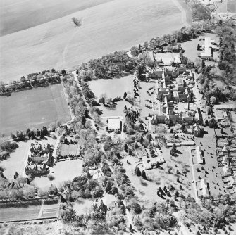 Oblique aerial view centred on the hospital and offices, taken from the E.