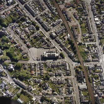 Oblique aerial view of Broughty Ferry centred on the school, taken from the WNW.