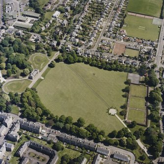Oblique aerial view centred on the park and pavilion, taken from the SW.